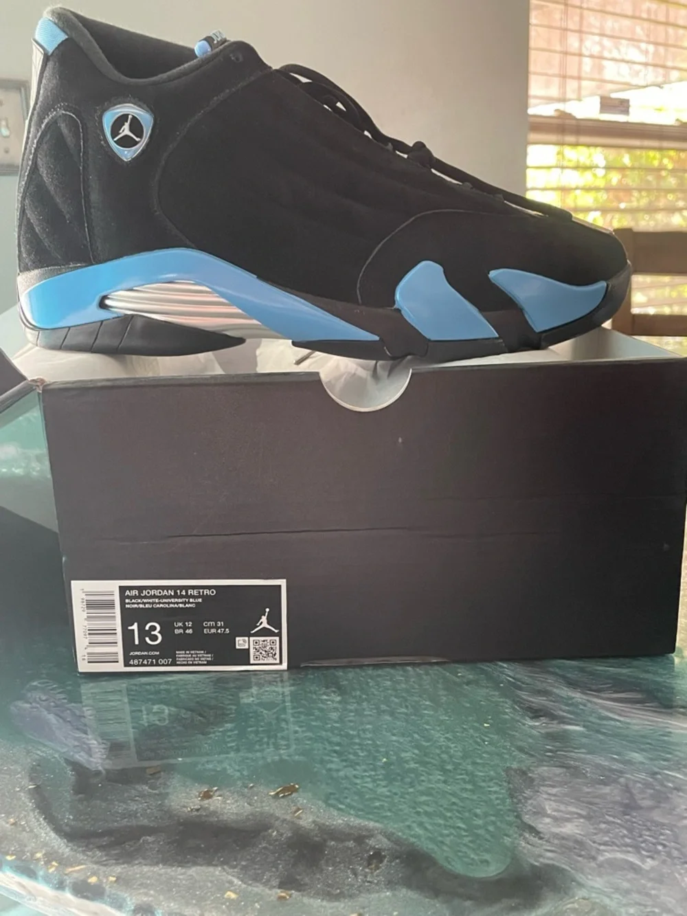 Air Jordan 14 Retro Men’s Black and University Blue Retro Sneakers - Picture 7 of 12